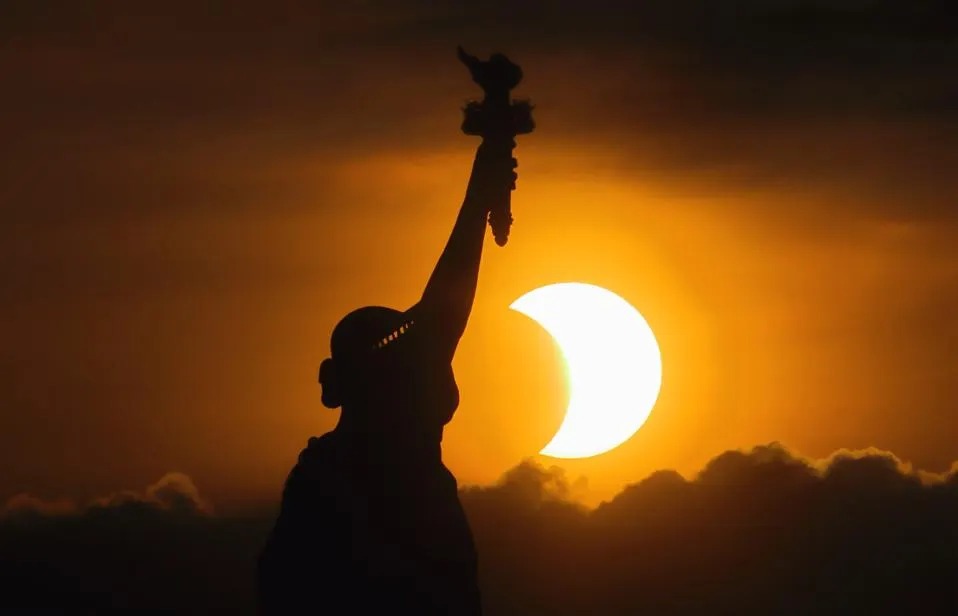A partial solar eclipse and the Perseid meteor shower will create a rare double sky event on Aug. 12–13. (Photo by Gary Hershorn/Getty Images) Getty Images