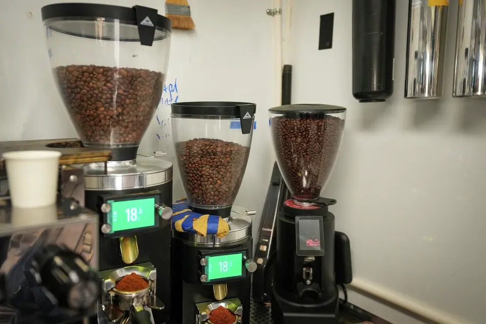 Coffee beans sit in grinders at Desnudo Coffee’s East Austin trailer. Black coffee has positive effects on the heart, according o the American Heart Association. Jay Janner/Austin American-Statesman