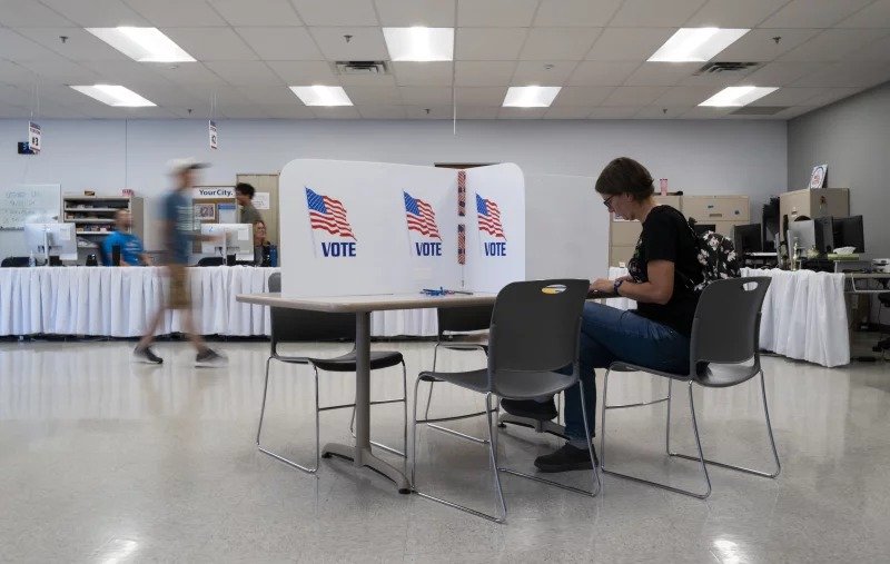 A voter fills out their ballot at the Minneapolis Elections & Voter Services building on September 20, 2024 in Minneapolis, Minn. Stephen Maturen/Getty Images