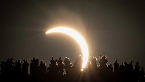 People view the partial solar eclipse besides the historic St. Michael’s Church tower, a Grade I listed building at the top of Glastonbury Tor on August 12, 2026 in Glastonbury, England. Matt Cardy | Getty Images News | Getty Images