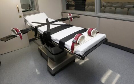 FILE - This Oct. 9, 2014, file photo shows the gurney in the execution chamber at the Oklahoma State Penitentiary in McAlester, Okla. Sue Ogrocki/AP