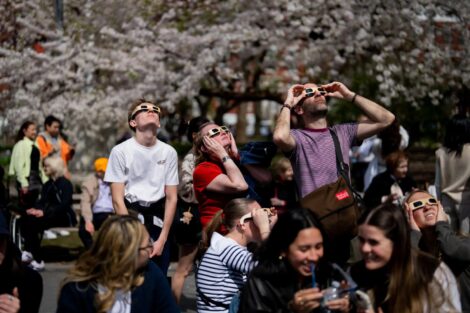 Watching the solar eclipse at Washington Square Park in New York in 2024. Credit...Amir Hamja/The New York Times
