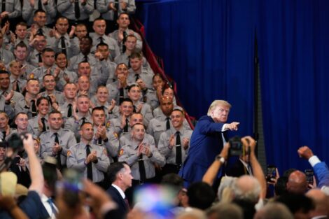 President Donald Trump leaves the stage after speaking in Garden City, New York. (Yuki Iwamura/AP)