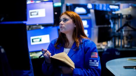 A trader works on the floor of the New York Stock Exchange. NYSE