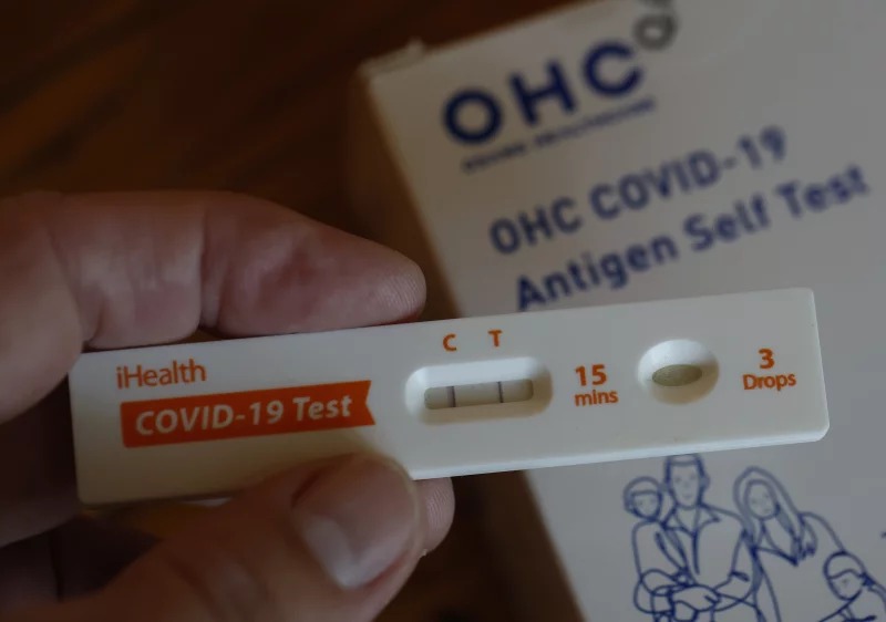 A positive COVID home test is shown in this image. Public health experts say we're now in the midst of a growing summer surge of COVID in the U.S. Justin Sullivan/Getty Images